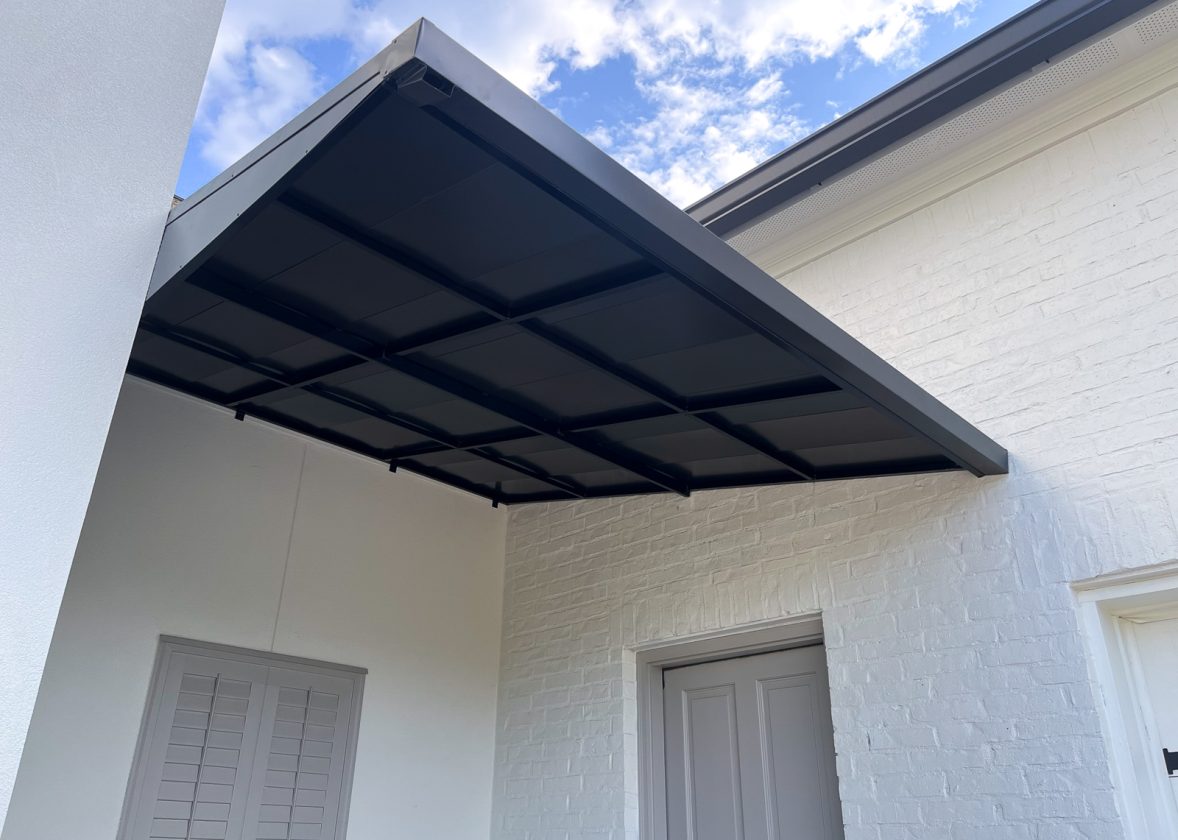 Awning World Examines How Fixed Awnings Help Reduce Weather-Related Wear at Retail Entrances